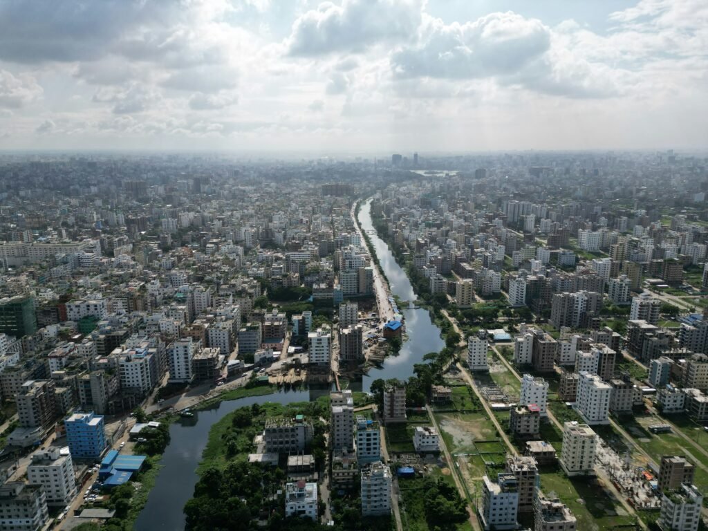 Aerial view of a river winding through Dhaka city, Bangladesh